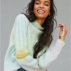 Oversized knit sweater from Anthropologie in pastel colors